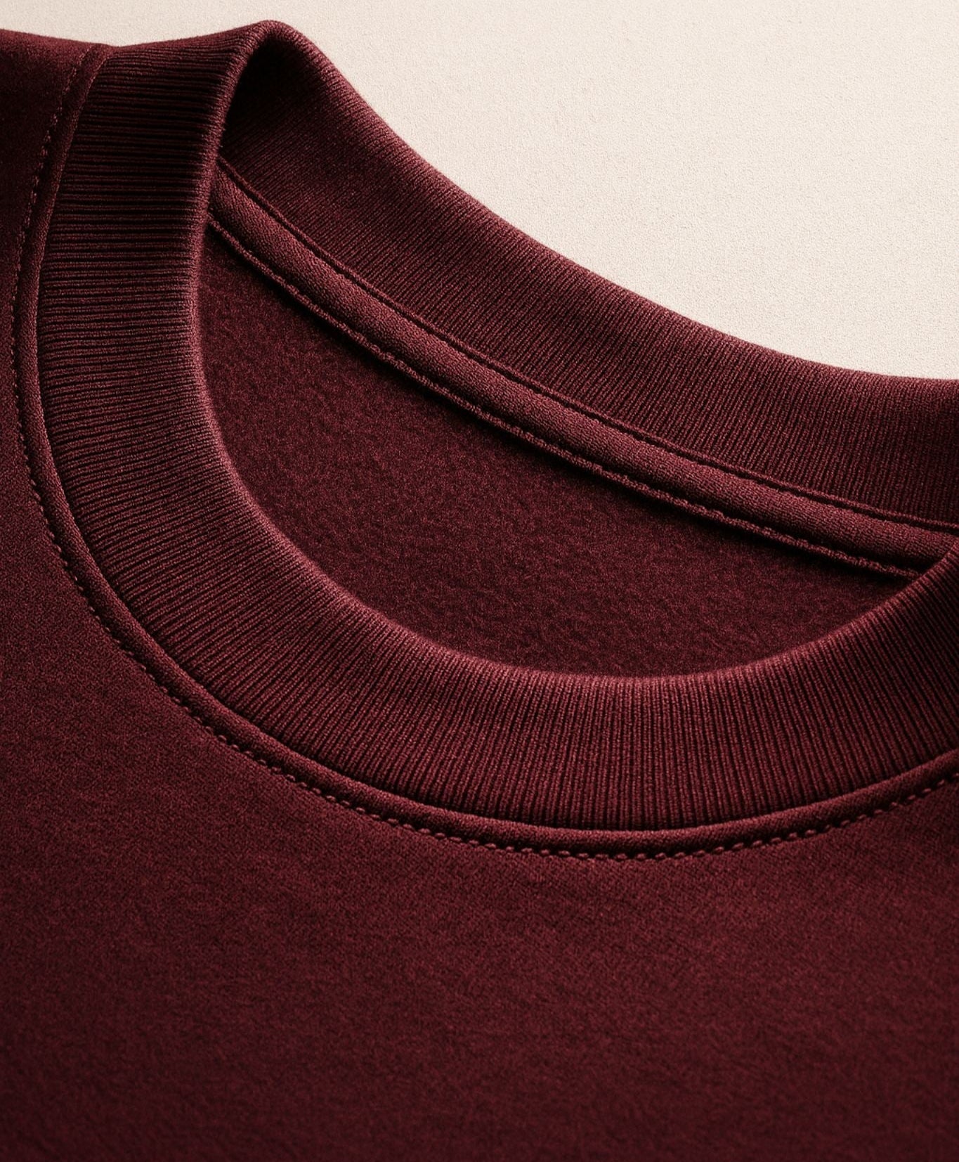 Detail of FineAF VISIONARY sweatshirt neckline — heavyweight organic cotton fleece, double-stitched seam.