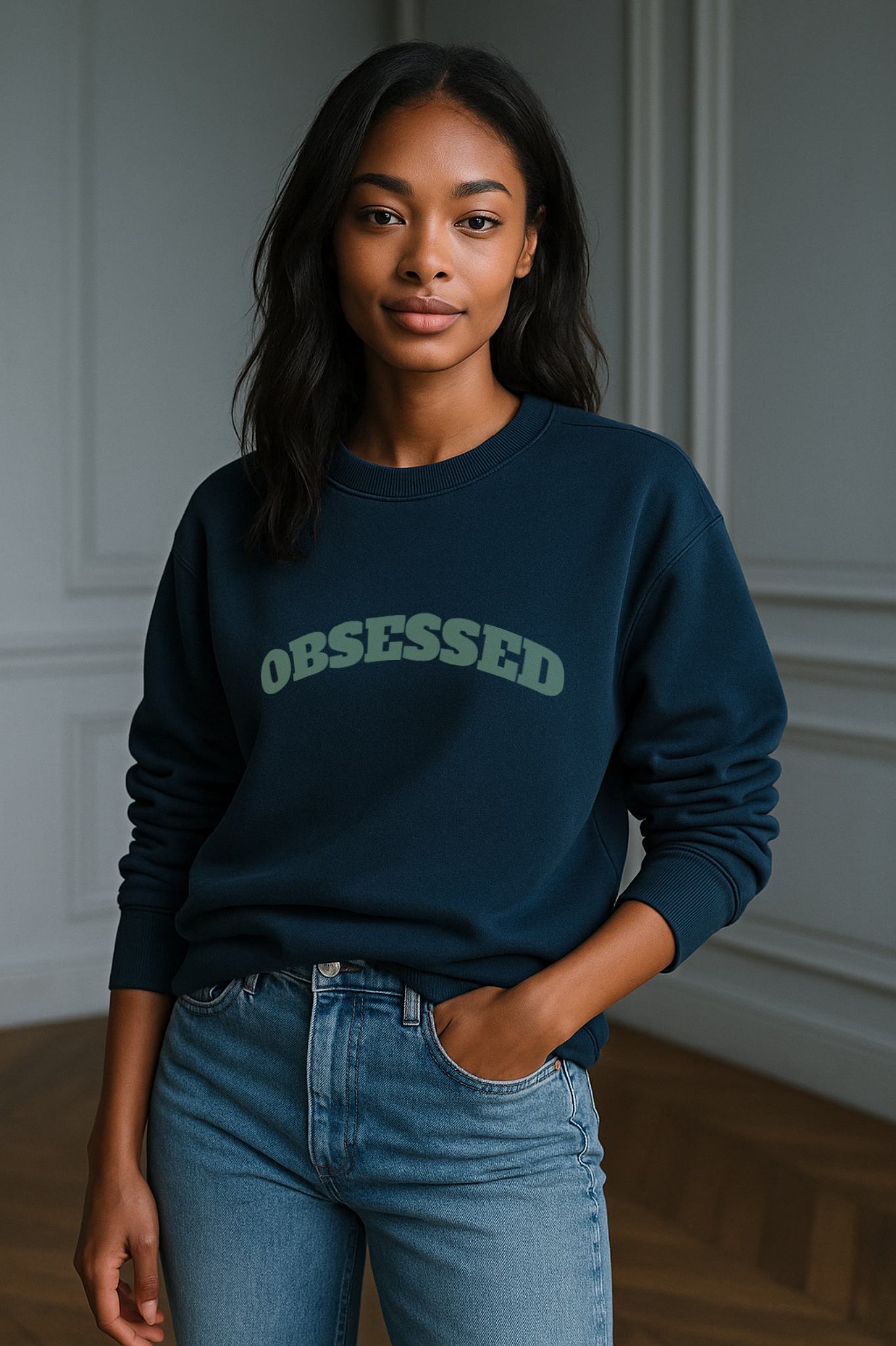 Model wearing FineAF OBSESSED sweatshirt in blue-teal organic cotton fleece, straight unisex fit.