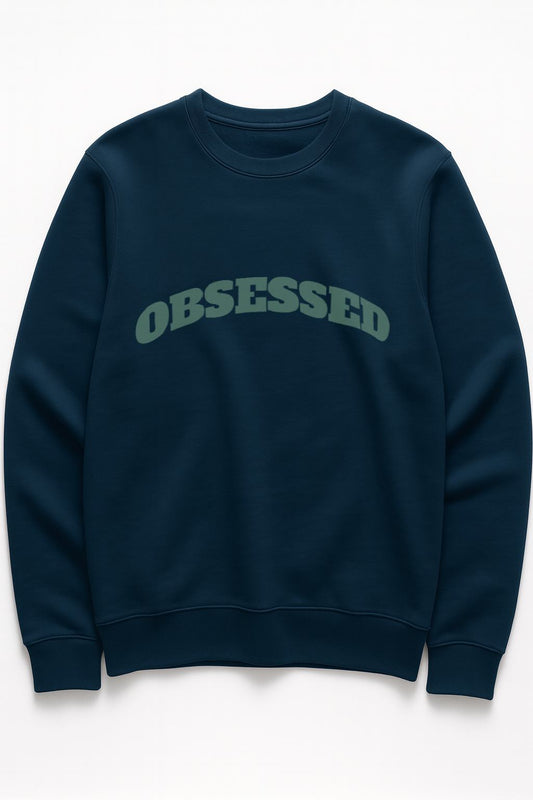 Blue-teal OBSESSED sweatshirt by FineAF, organic cotton fleece with sage text, front view.