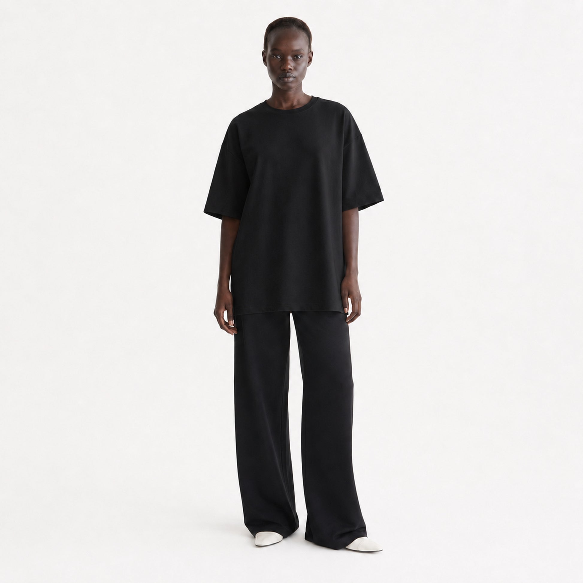 FineAF Collection One heavyweight drop-shoulder T-shirt in Black, front view on model