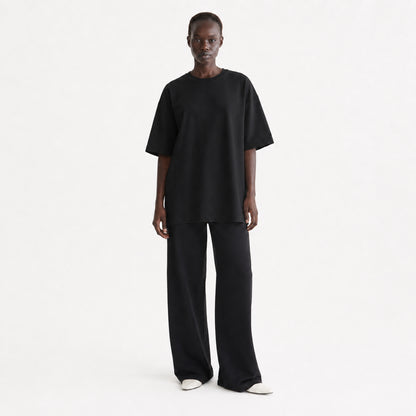FineAF Collection One heavyweight drop-shoulder T-shirt in Black, front view on model