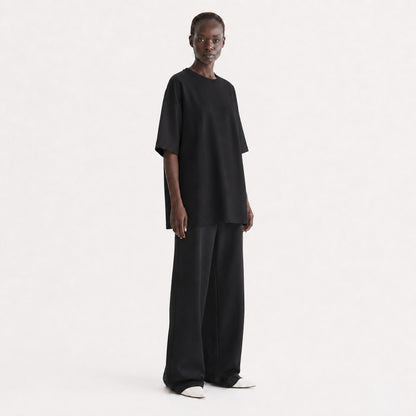 FineAF Collection One heavyweight drop-shoulder T-shirt in Black, three-quarter view on model