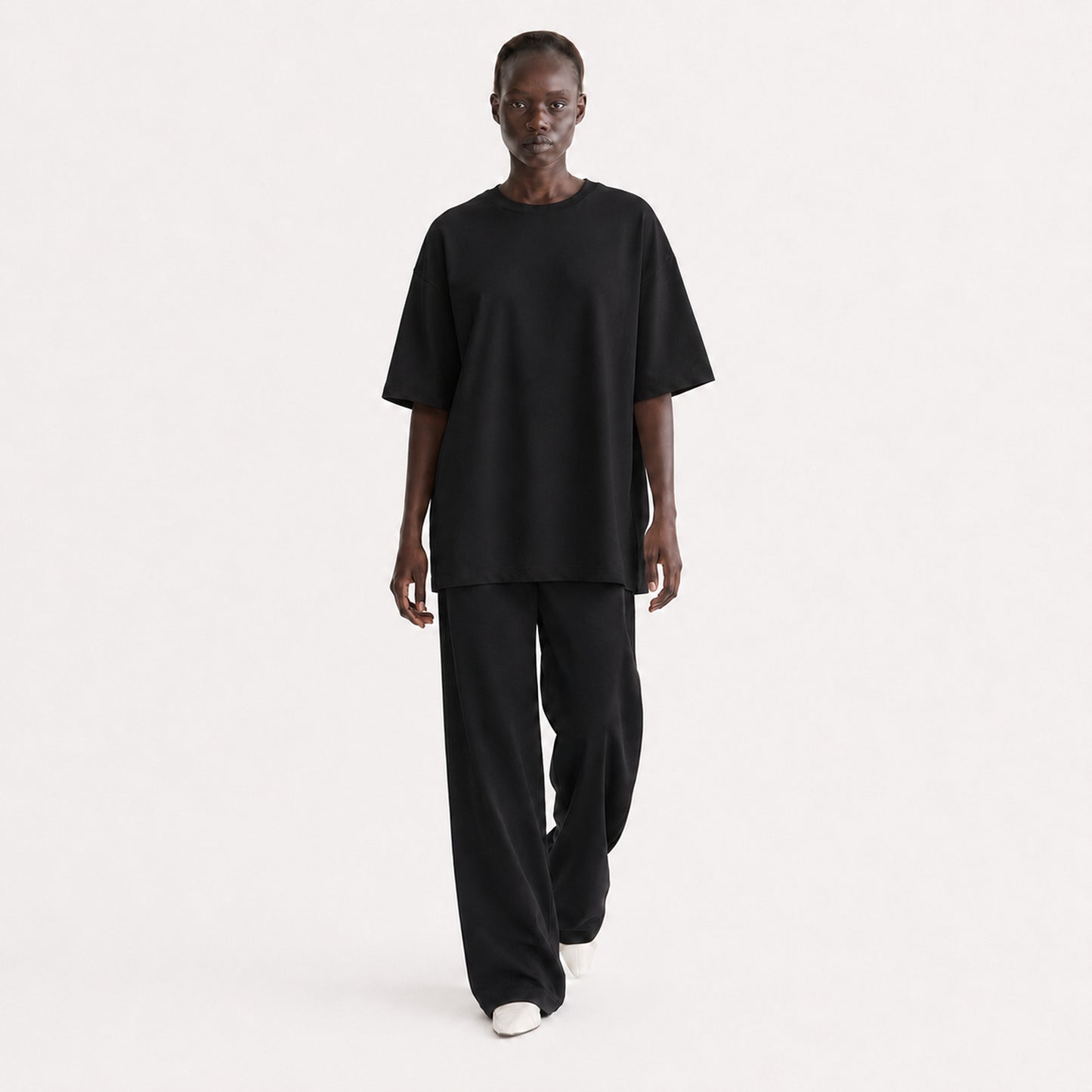 FineAF Collection One heavyweight drop-shoulder T-shirt in Black, movement pose on model