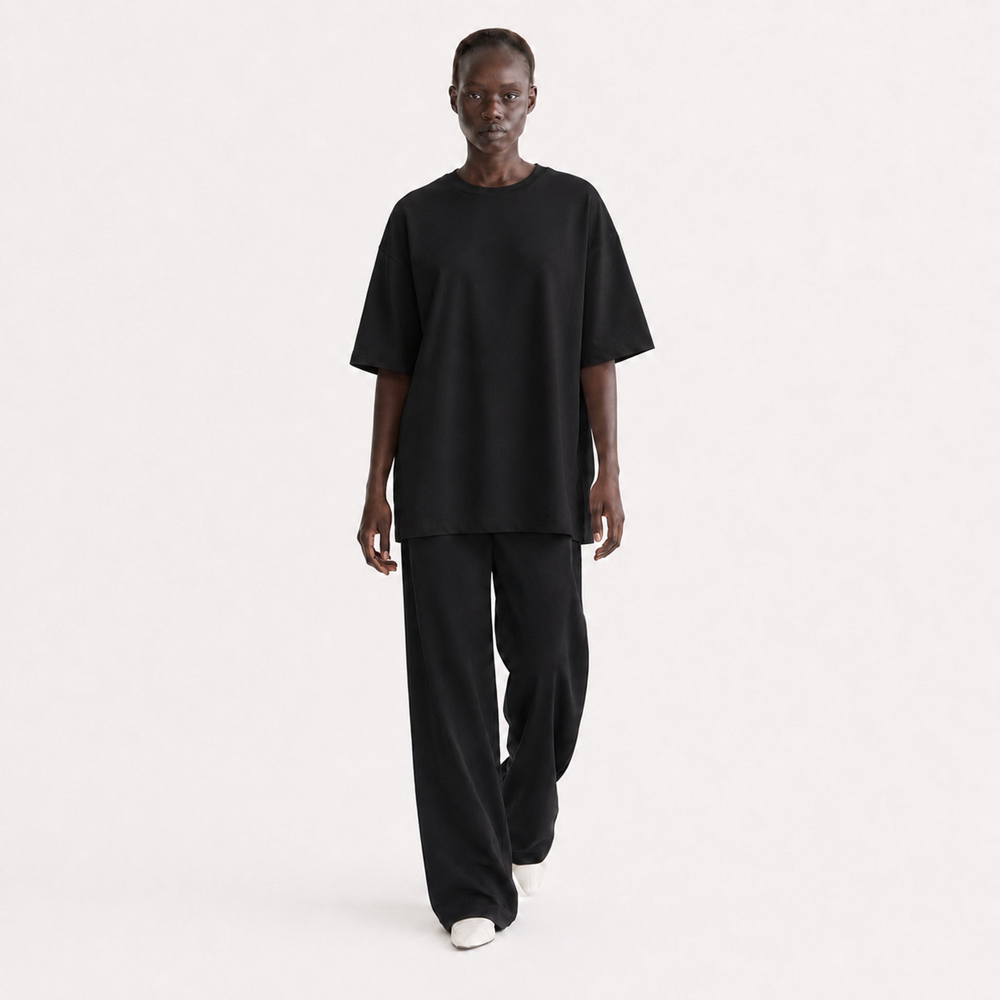 FineAF Collection One heavyweight drop-shoulder T-shirt in Black, movement pose on model