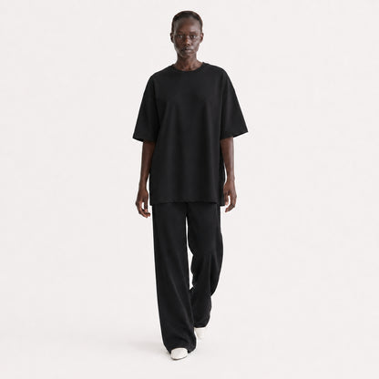 FineAF Collection One heavyweight drop-shoulder T-shirt in Black, movement pose on model