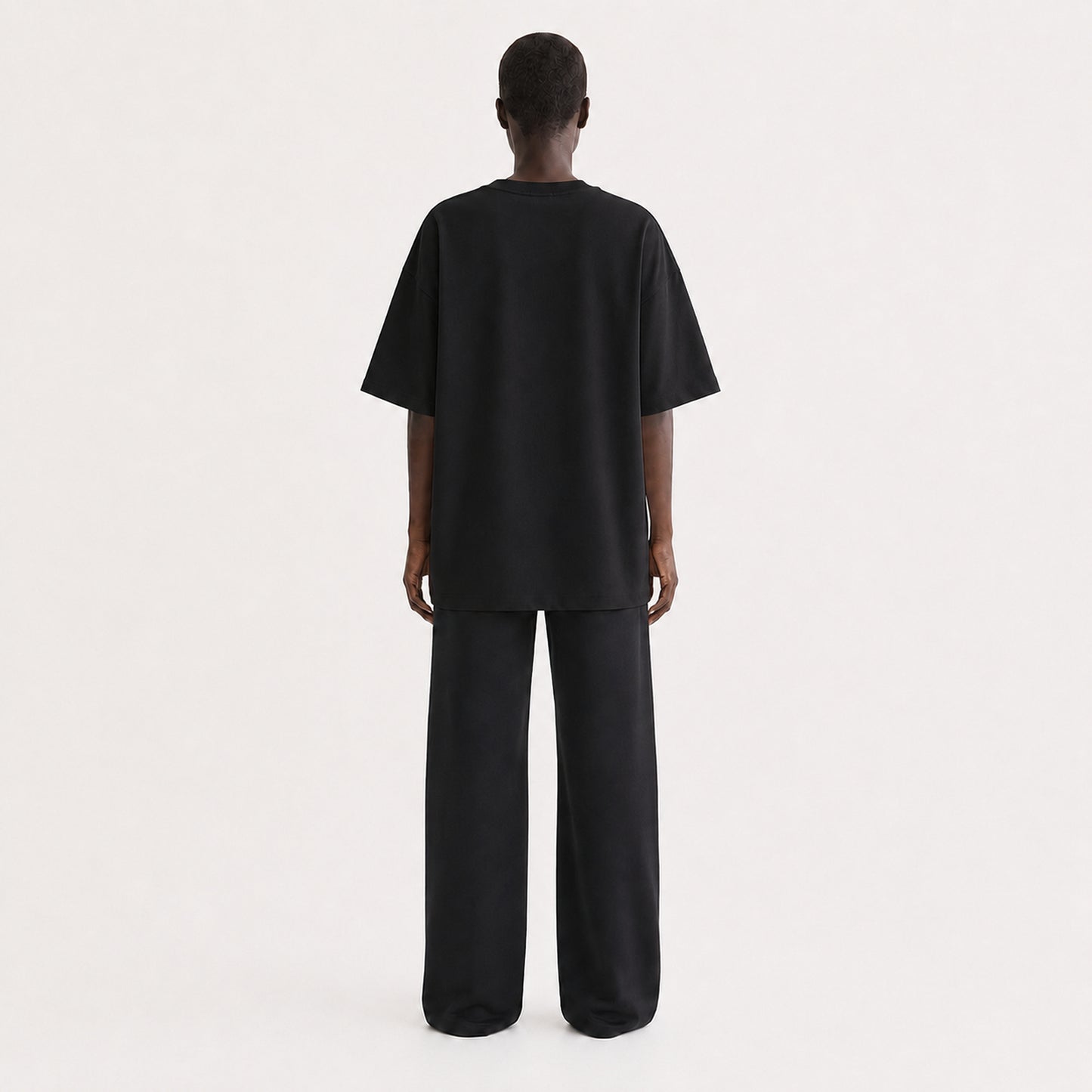 FineAF Collection One heavyweight drop-shoulder T-shirt in Black, back view on model