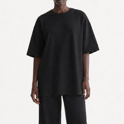 FineAF Black heavyweight T-shirt, cropped torso view showing dropped shoulders and straight hem