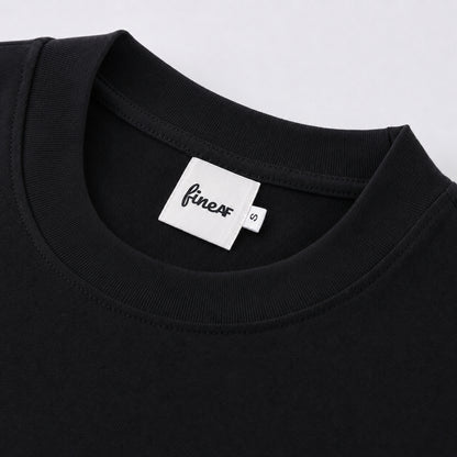 FineAF Black heavyweight T-shirt neckline and FineAF label detail
