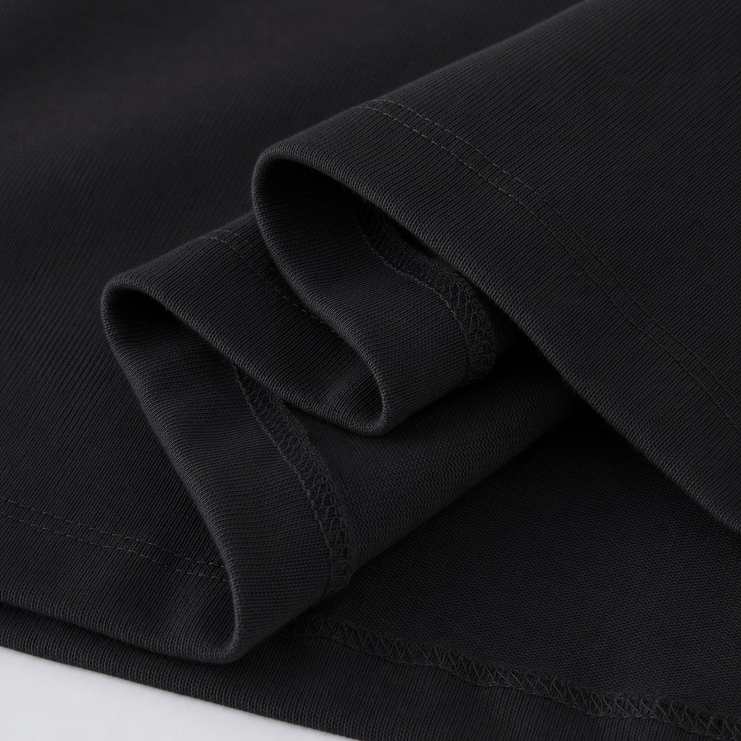 FineAF Black heavyweight T-shirt sleeve opening detail