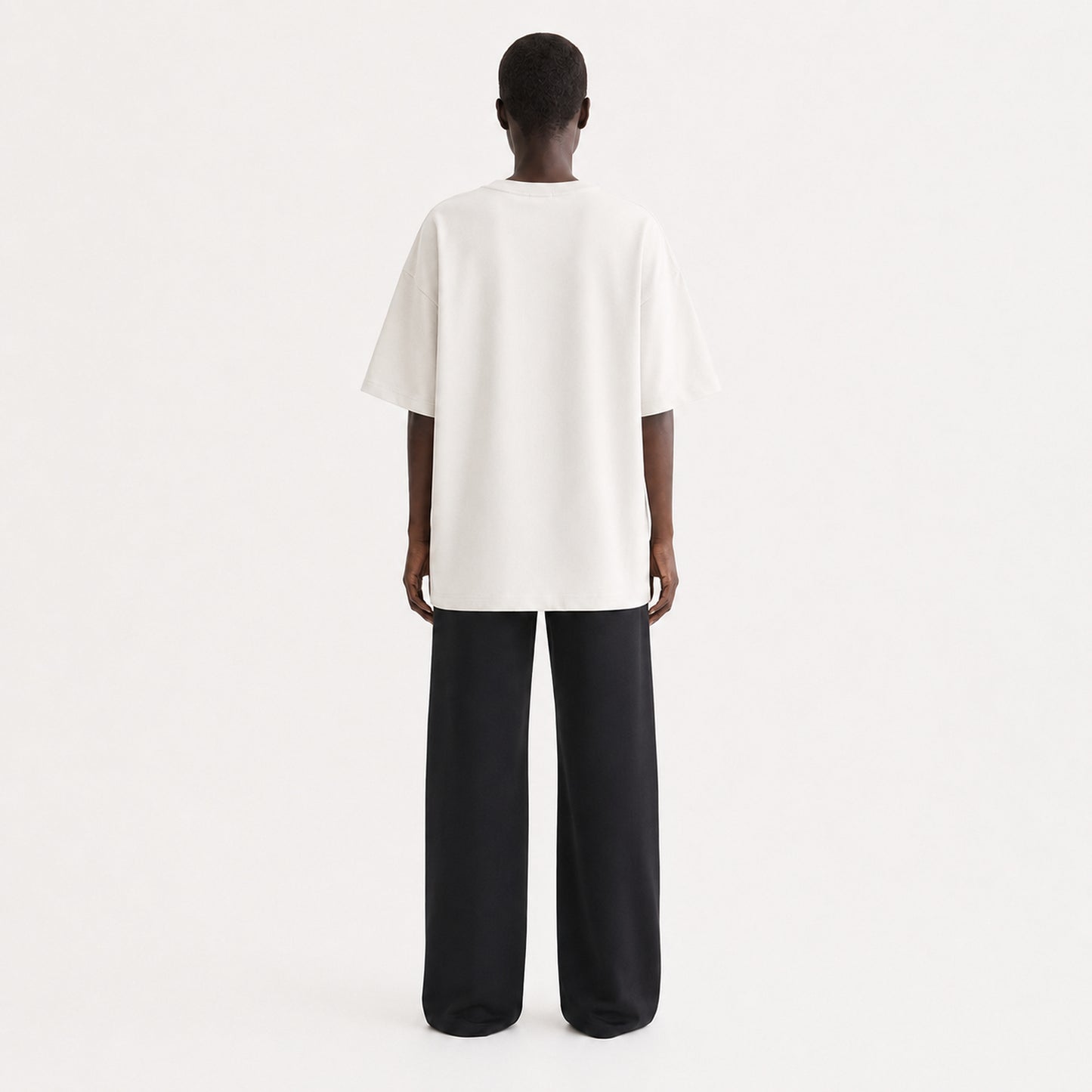 FineAF Collection One heavyweight drop-shoulder T-shirt in Oat, back view on model