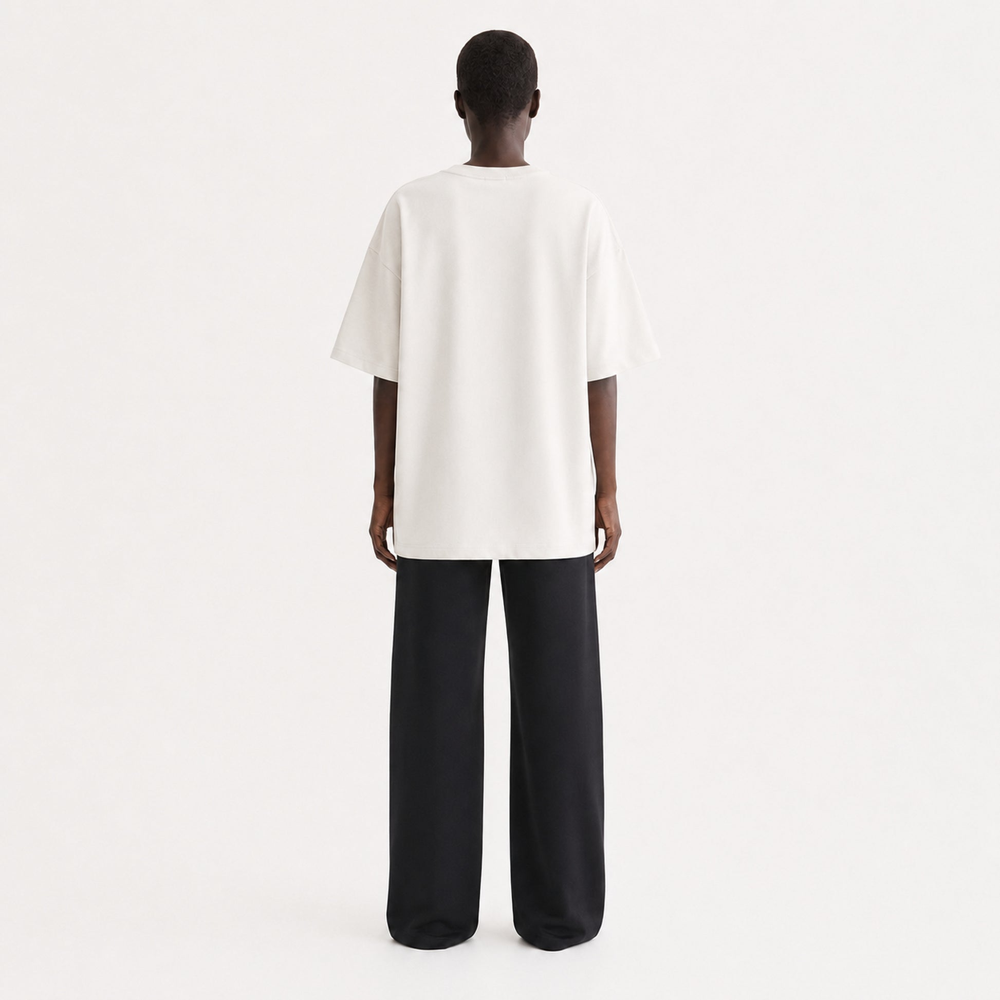 FineAF Collection One heavyweight drop-shoulder T-shirt in Oat, back view on model