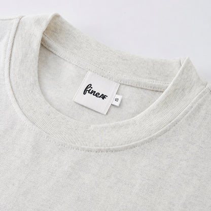FineAF Oat heavyweight T-shirt neckline and FineAF label detail