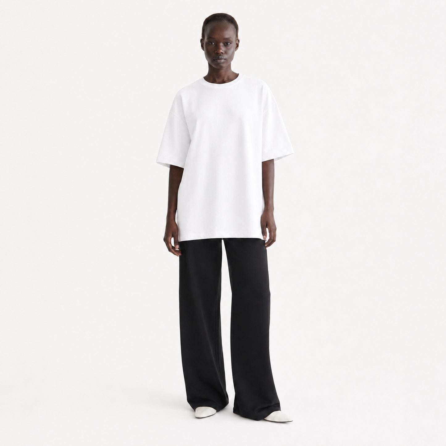 FineAF Collection One heavyweight drop-shoulder T-shirt in White, front view on model