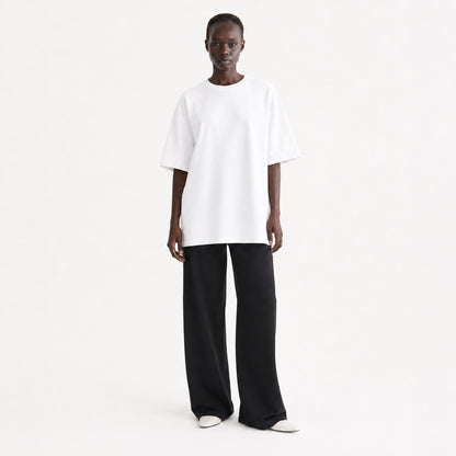 FineAF Collection One heavyweight drop-shoulder T-shirt in White, front view on model