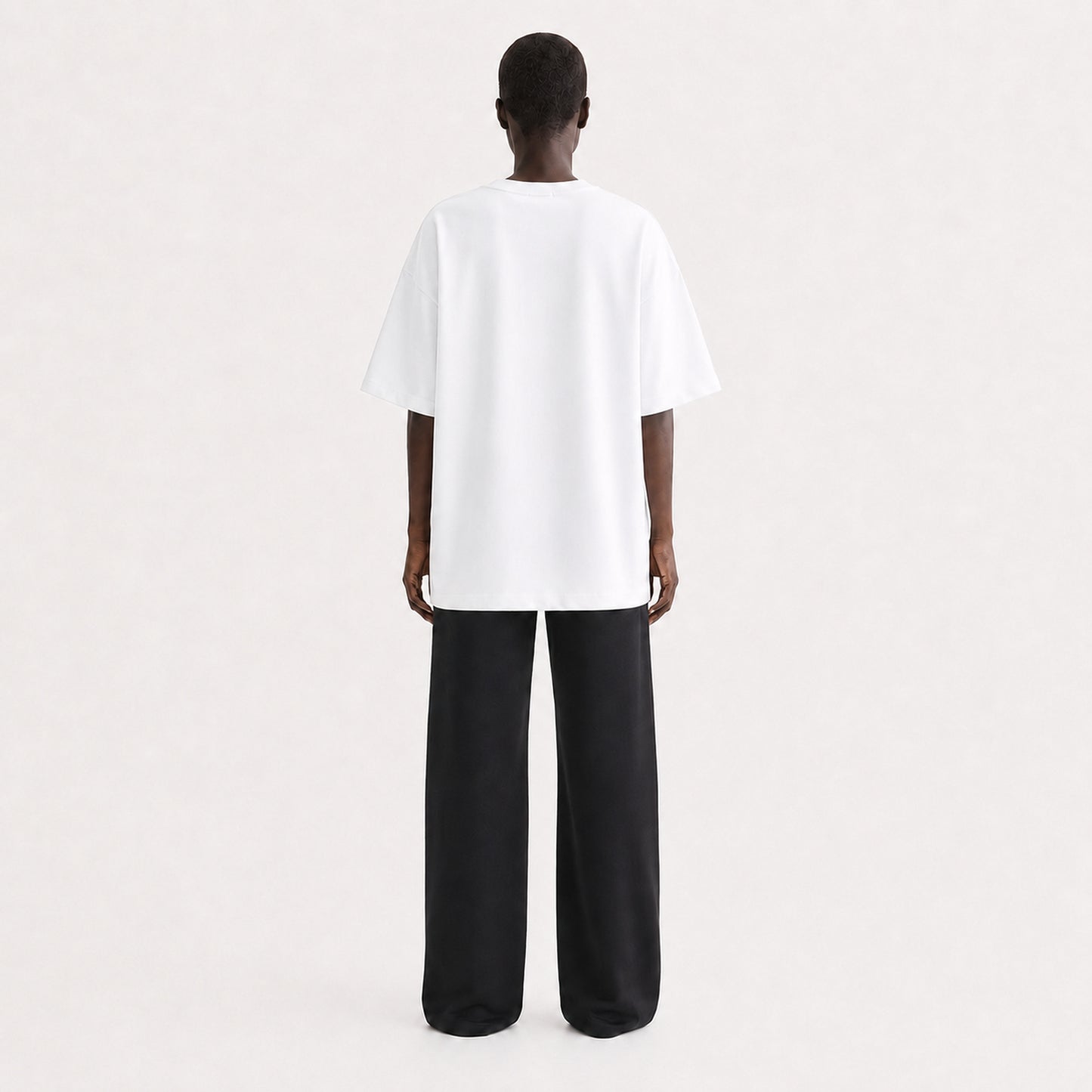 FineAF Collection One heavyweight drop-shoulder T-shirt in White, back view on model