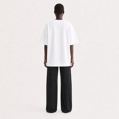 FineAF Collection One heavyweight drop-shoulder T-shirt in White, back view on model