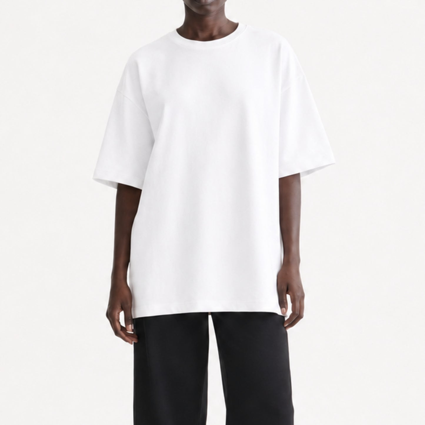 FineAF White heavyweight T-shirt, cropped torso view showing dropped shoulders and straight hem