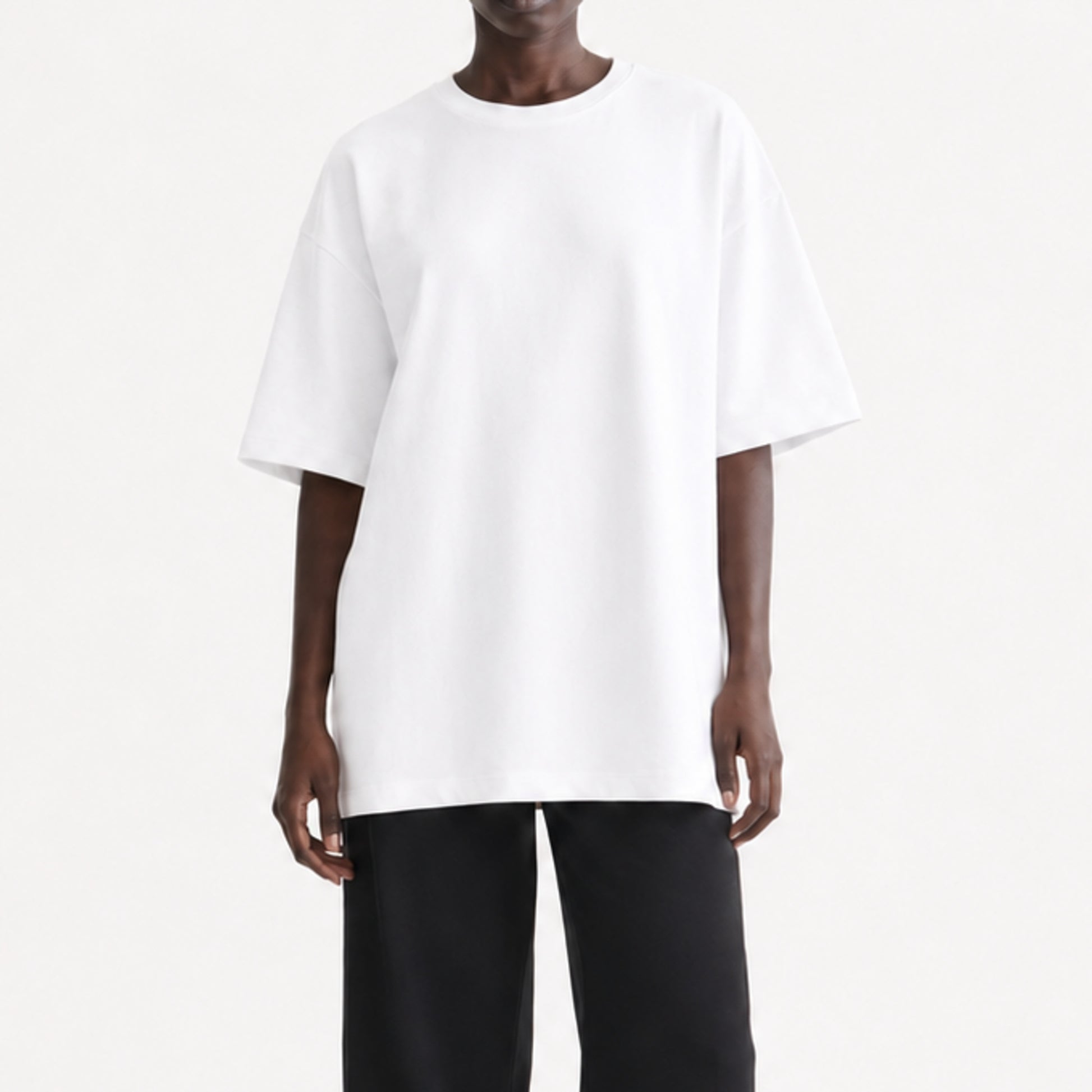 FineAF White heavyweight T-shirt, cropped torso view showing dropped shoulders and straight hem