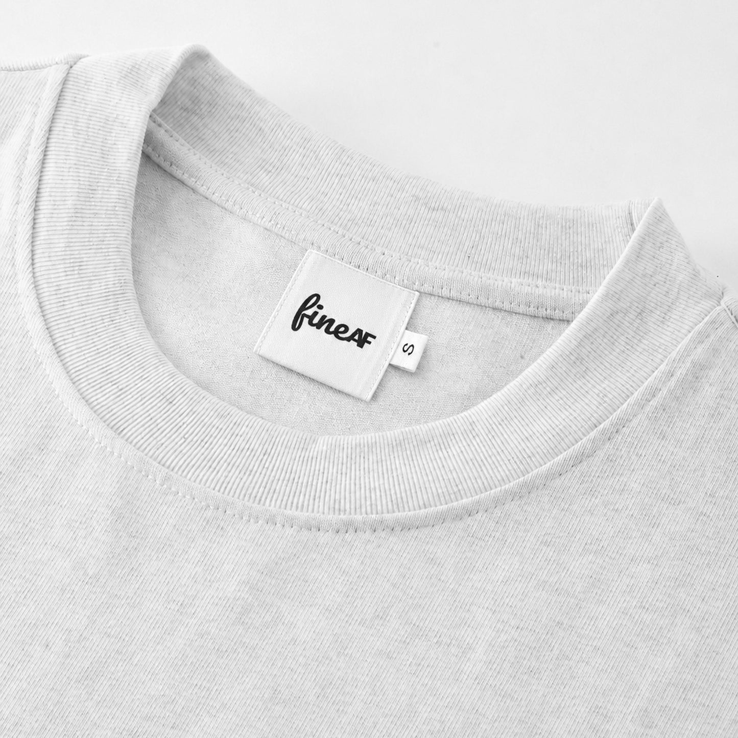 FineAF White heavyweight T-shirt neckline and FineAF label detail