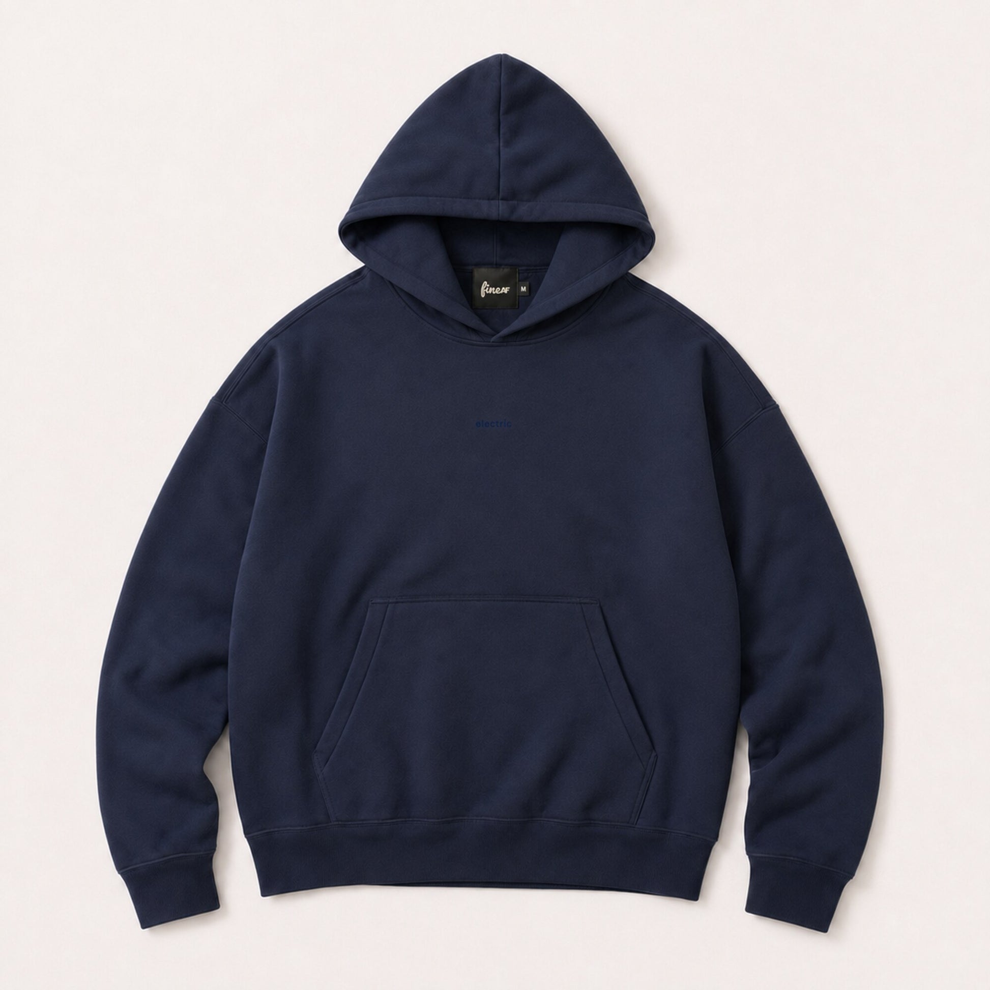 Front flat lay of the FineAF Electric deep navy hoodie with dark tonal chest design and black neck label