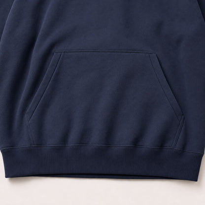 Close-up of the FineAF Electric hoodie shaped front pocket and thick ribbed hem