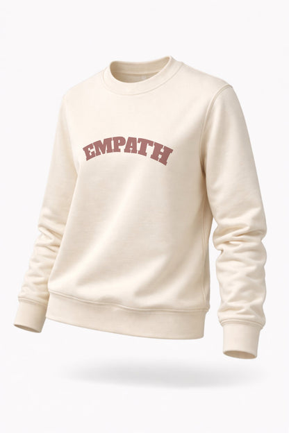 Ivory FineAF crewneck sweatshirt with “EMPATH” print, studio angled front product image.