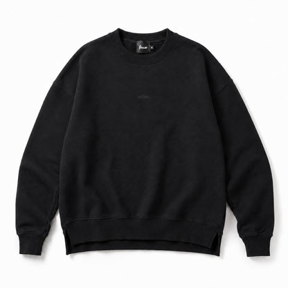 Front flat lay of the FineAF Iconic black side-slit crewneck sweatshirt with a tiny tonal iconic chest design.