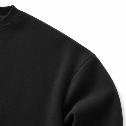 Close-up of the FineAF Iconic black sweatshirt extreme dropped-shoulder construction and heavyweight fleece.