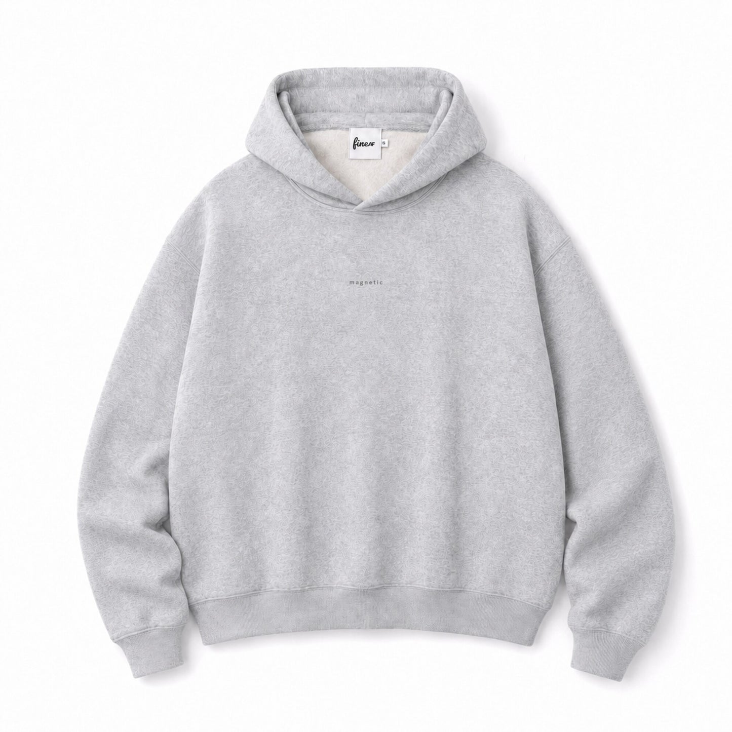 Front flat lay of the FineAF Magnetic heather grey hoodie with tonal magnetic chest design and FineAF neck label