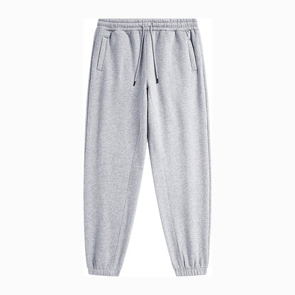 Front flat lay of light grey FineAF Magnetic pants with drawcord, welt pockets and elastic ankles