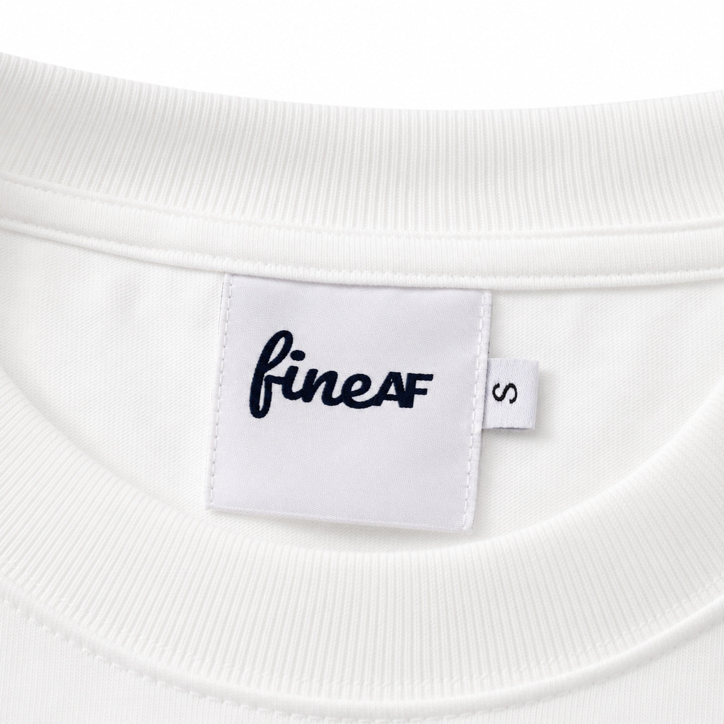 White FineAF Boxy Tee ribbed neckline and woven inside neck label