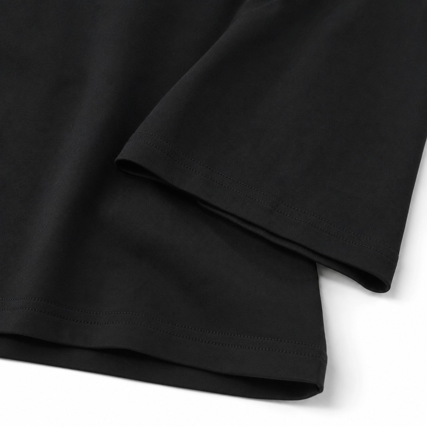 Black FineAF Boxy Tee sleeve hem stitching and heavy cotton jersey detail