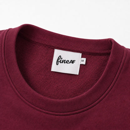 Close-up of the FineAF Visionary sweatshirt ribbed collar, brushed interior and FineAF neck label