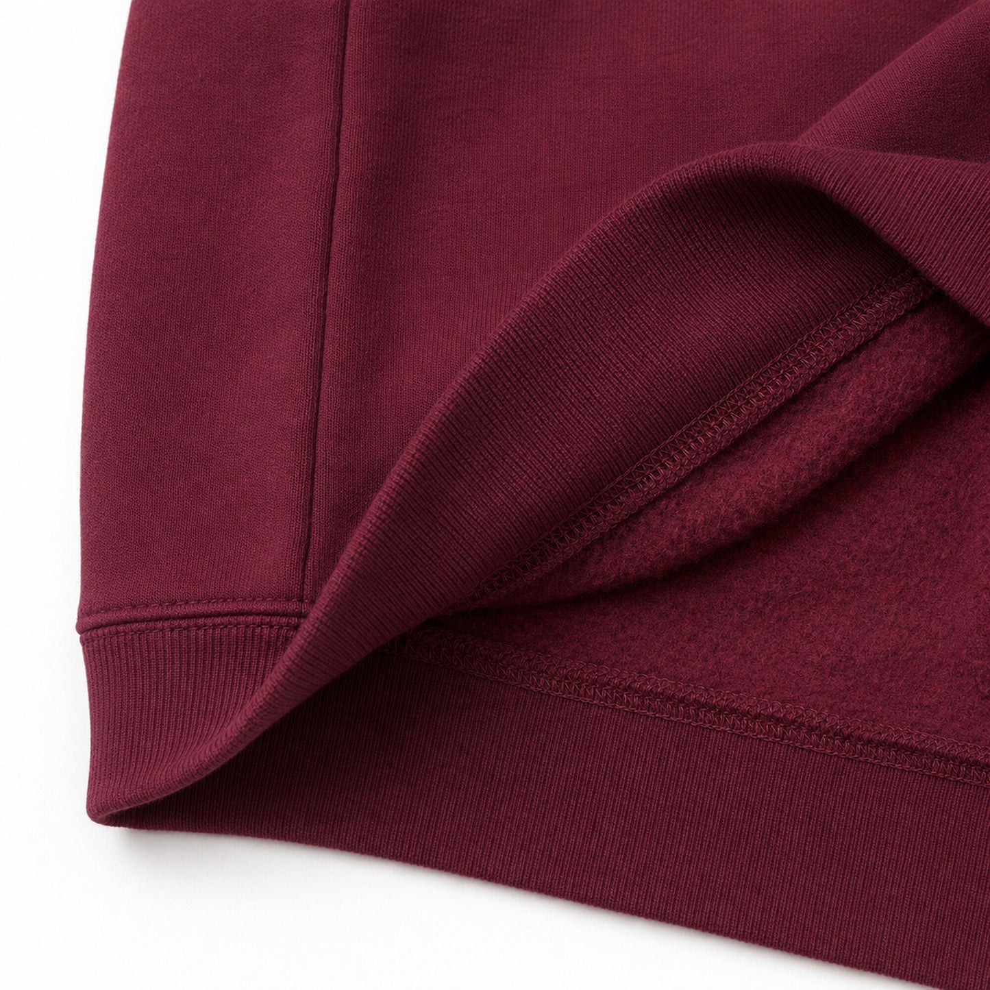 Close-up of the FineAF Visionary sweatshirt ribbed hem and soft brushed interior